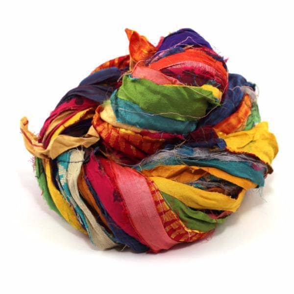 At the Bahamas: Multi Colored Sari Silk Ribbon Yarn donut ball on a white background