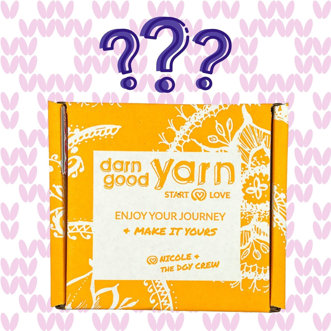 light yellow branded cardboard box in front of pink question mark background with 3 purple question marks above.