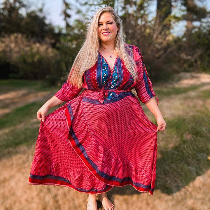 A woman wearing a red dress.